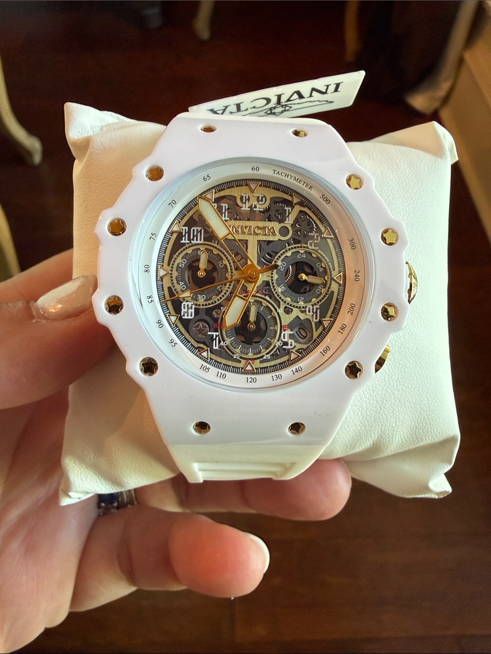 Invicta White Ceramic Skeleton Dial Watch with Gold Accents
